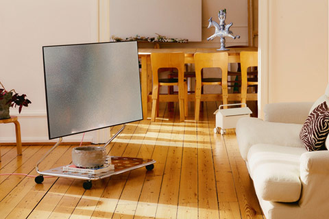 Pedestal Disco TV Stand With Wheels - Lifestyle